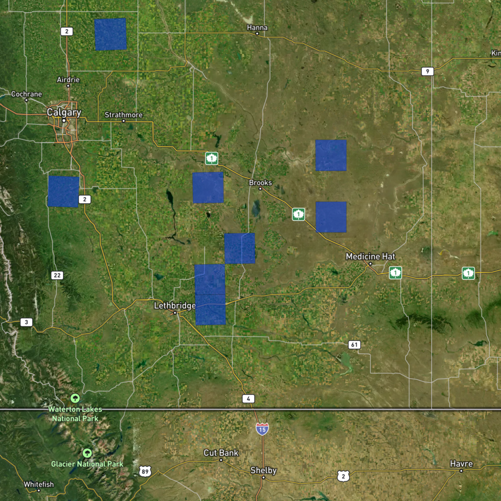 A map of southern Alberta with 8 blue squares on it representing the Areas Of Interest in this study.